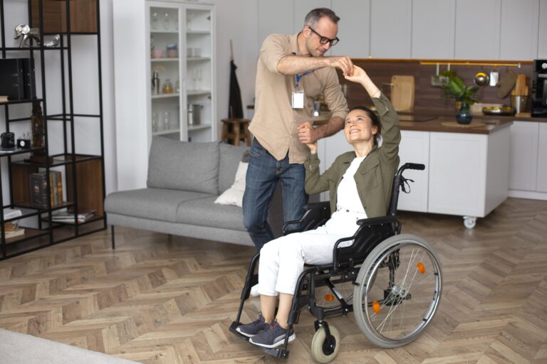 full shot smiley woman wheelchair