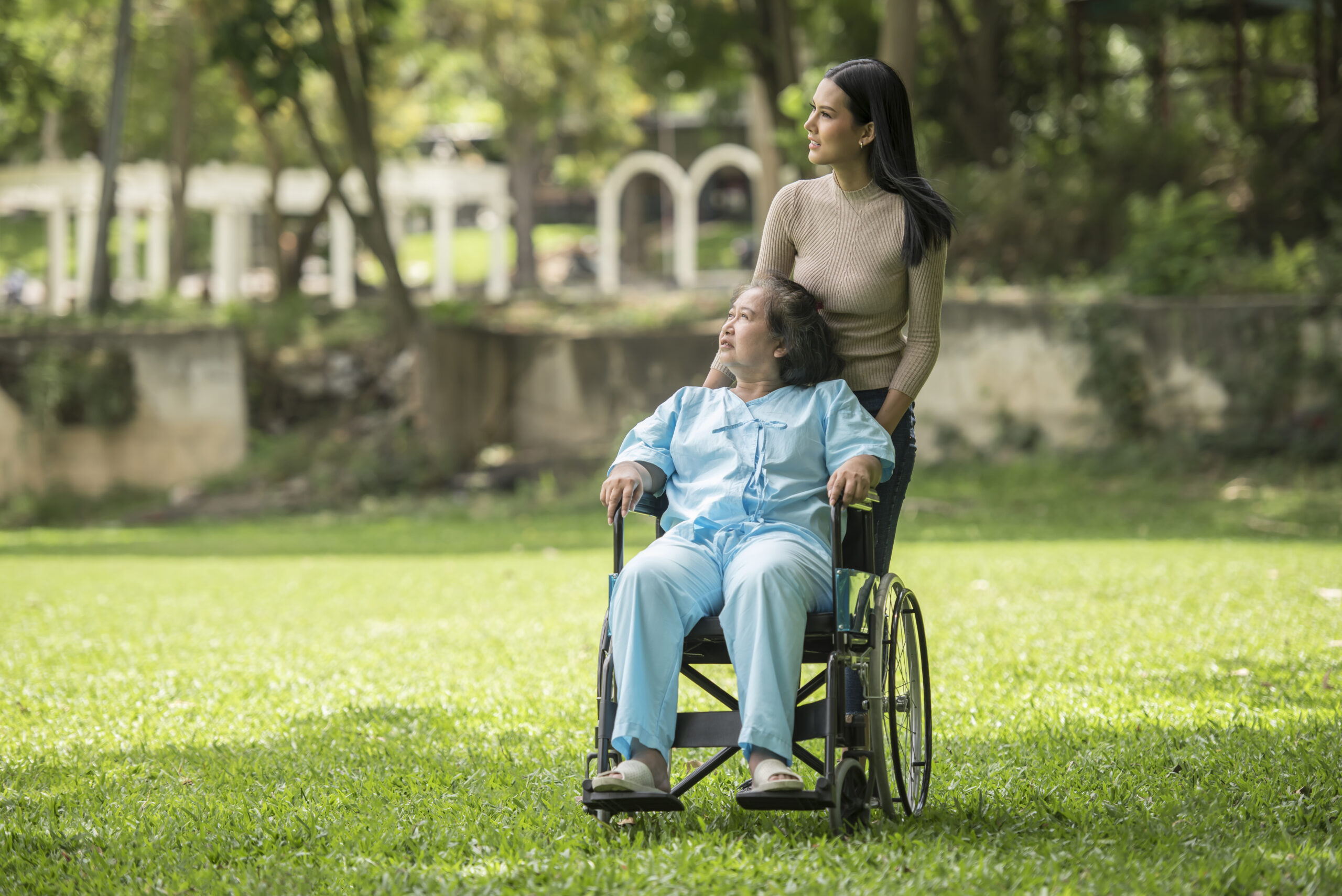 Granddaughter Talking With Her Grandmother Sitting Wheelchair Cheerful Concept Happy Family Scaled