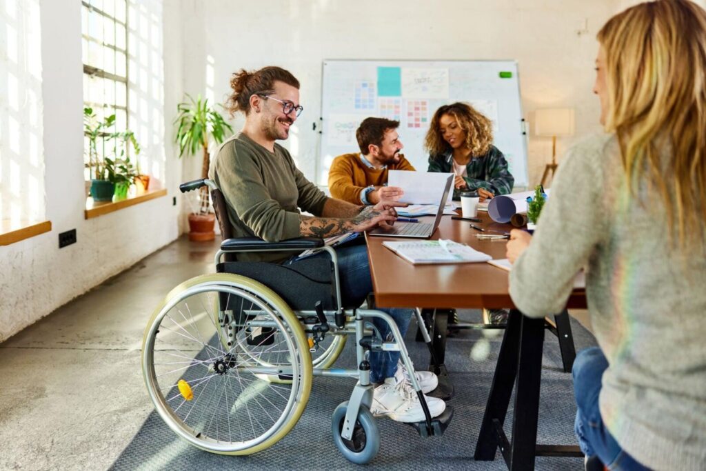 Support worker helping an NDIS participant with plan management in Victoria