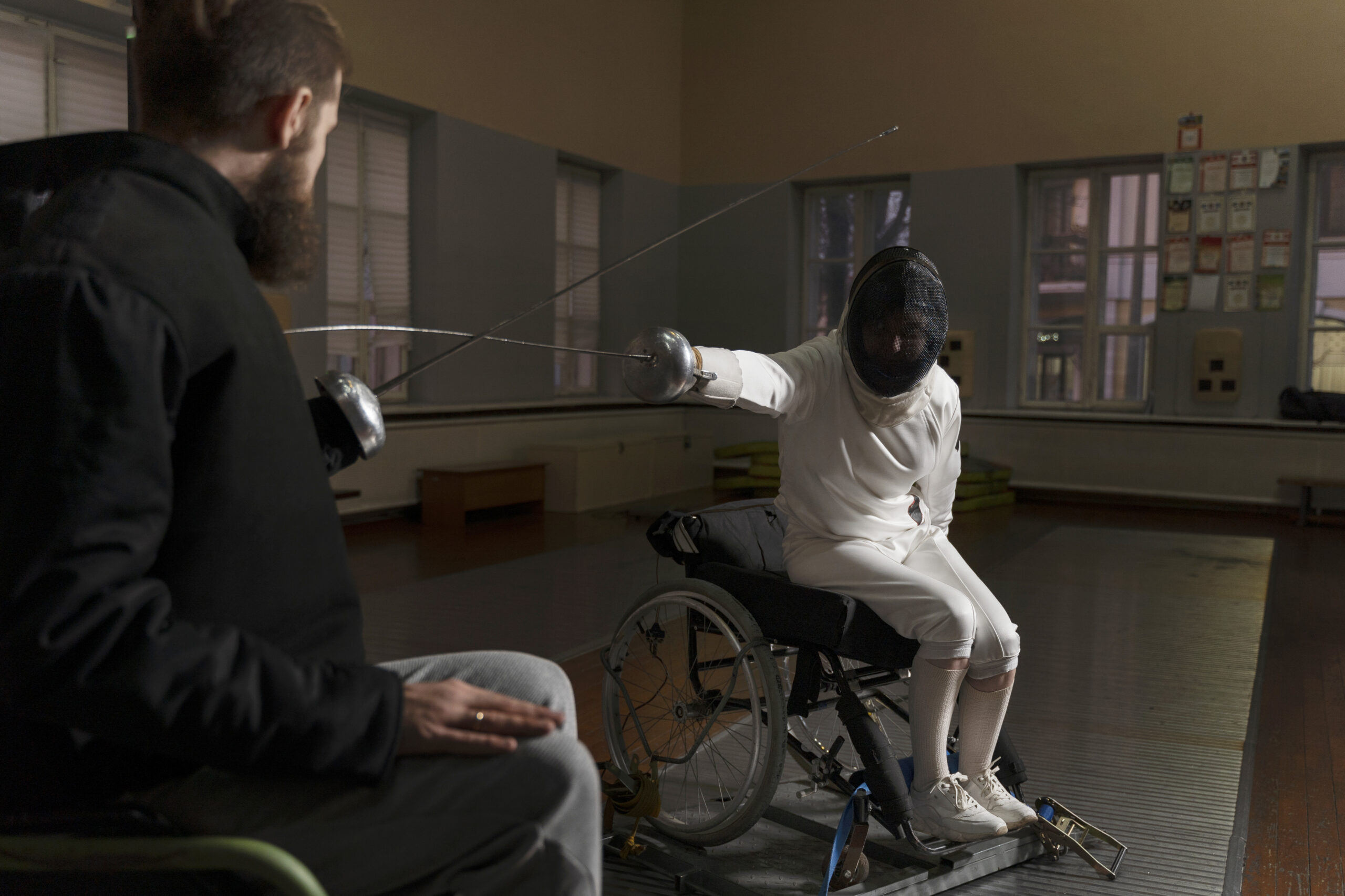 disabled fencers special equipment fighting from their wheelchairs