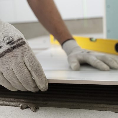 tiler working renovation apartment
